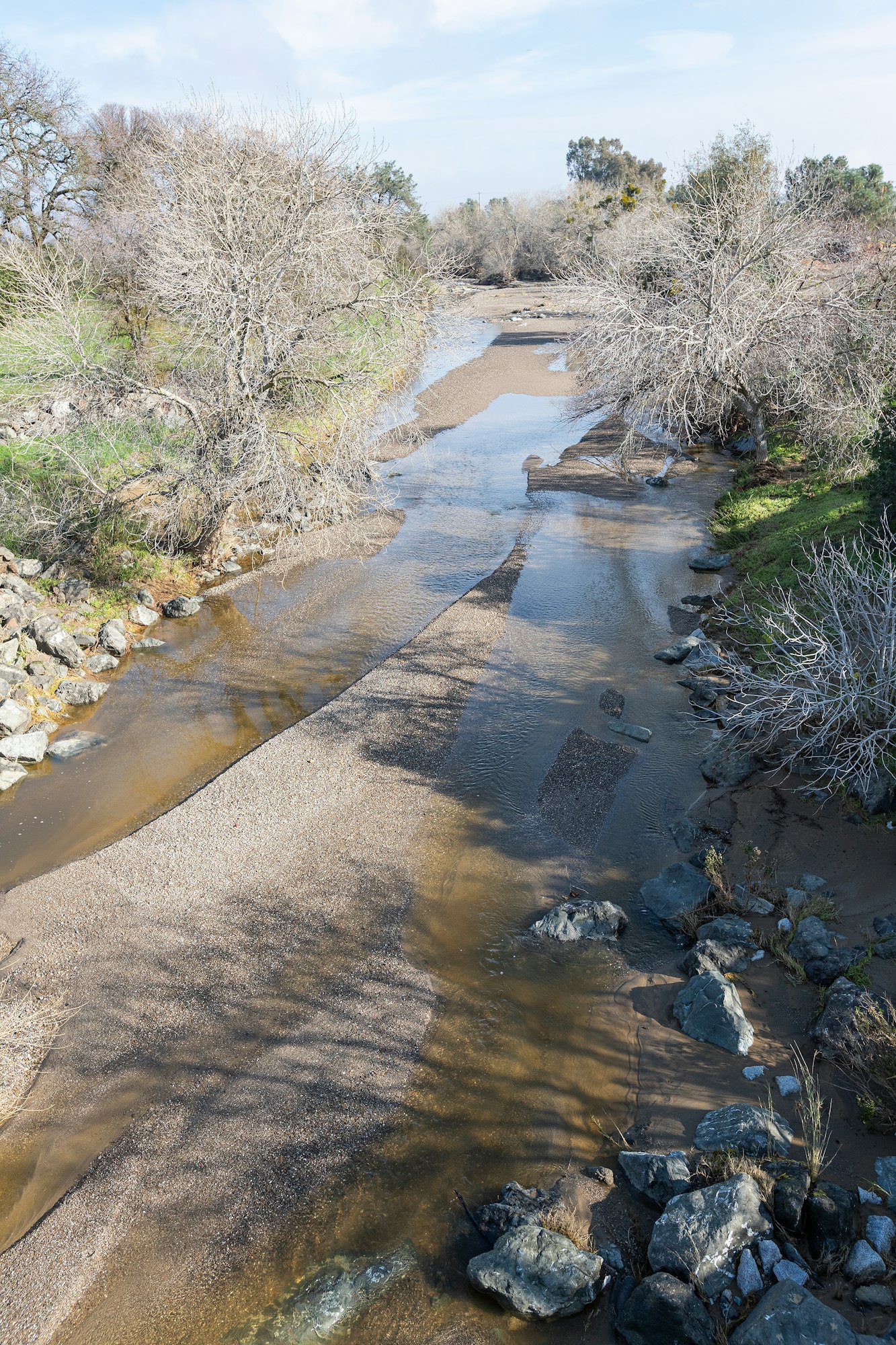 May contain: creek, nature, outdoors, stream, water, slate, gravel, and road