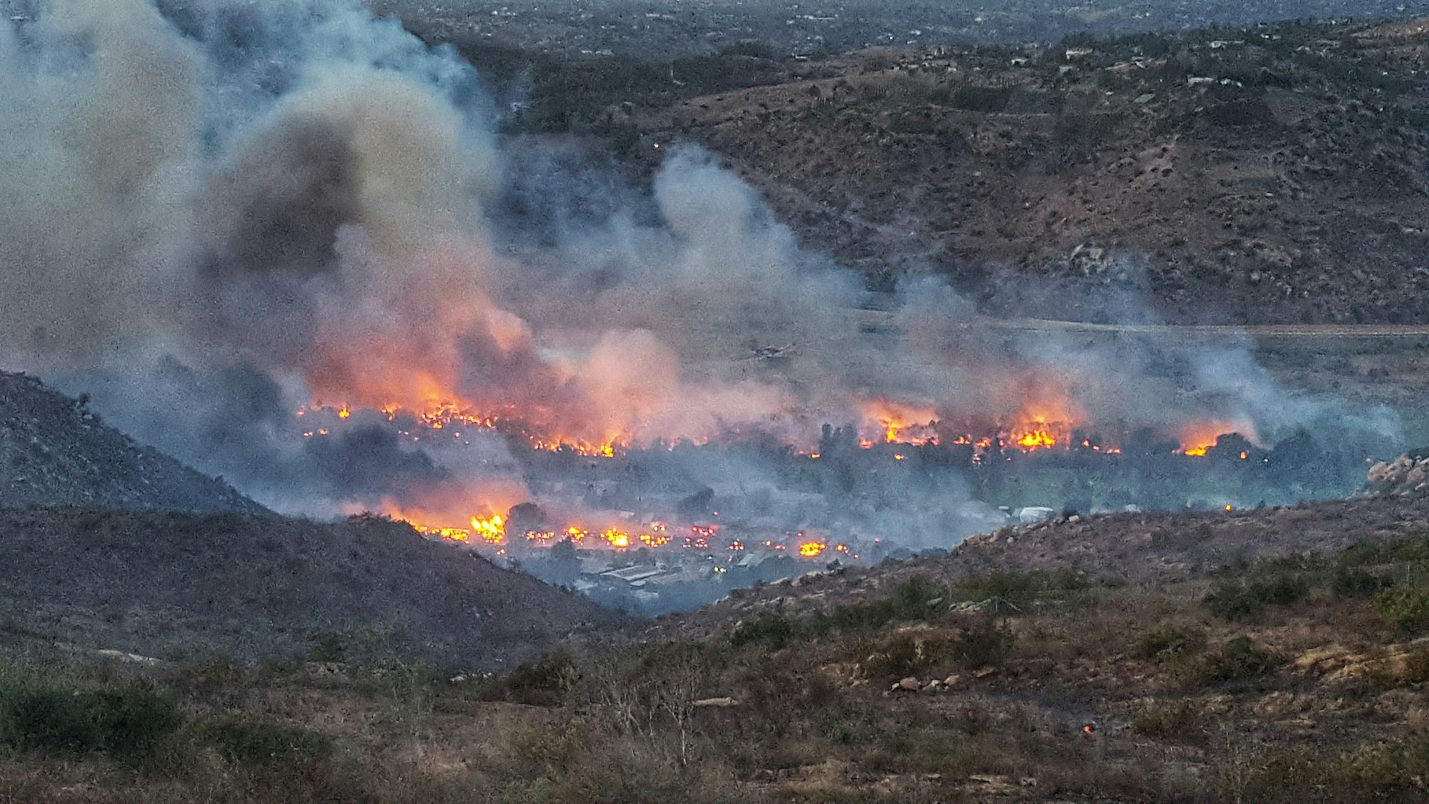 May contain: fire, mountain, nature, and outdoors