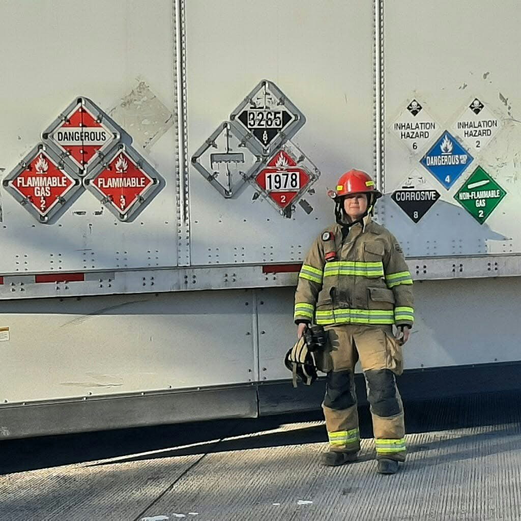 May contain: person and fireman