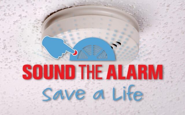 The image features a smoke alarm with a message encouraging people to "Sound the Alarm" to save lives.
