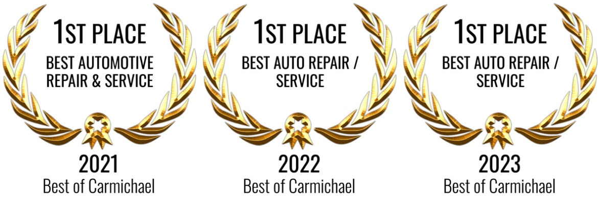 Three awards displaying "1st Place Best Auto Repair/Service" for Carmichael in 2021, 2022, and 2023.