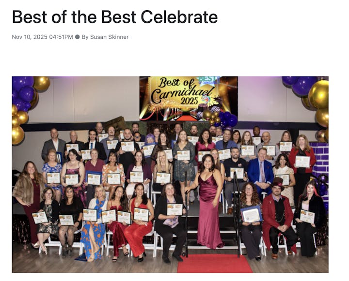 A group of people posing on stairs, holding certificates, with balloons and a "Best of Carmichael 2025" sign in the background.