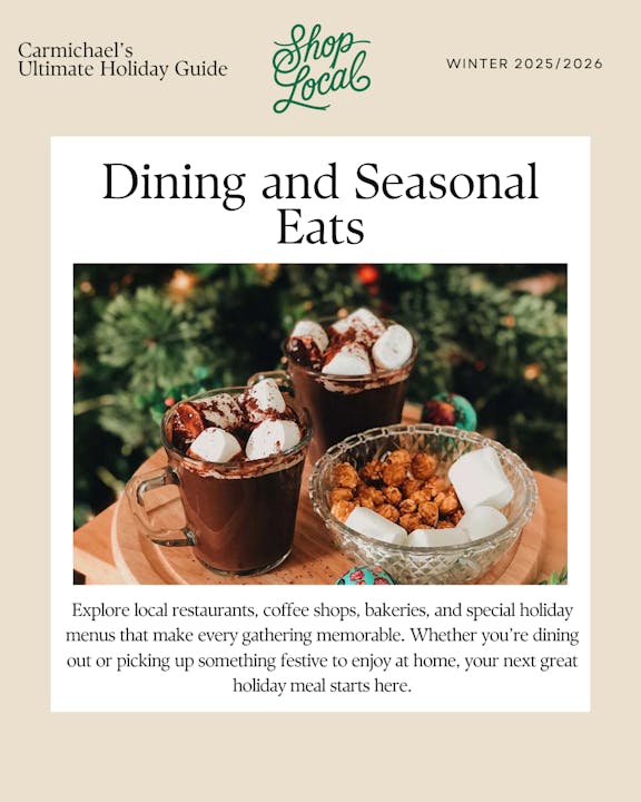 The image features hot chocolate with marshmallows and popcorn, promoting local dining options for the holidays.