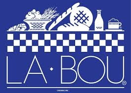 Illustration of food items and drink on a blue background with the text "LA•BOU."