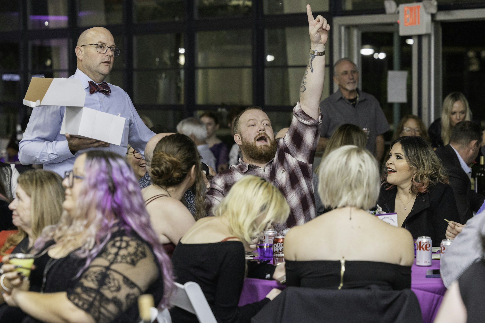 May contain: adult, female, person, woman, people, accessories, formal wear, tie, glasses, jewelry, necklace, male, man, and head