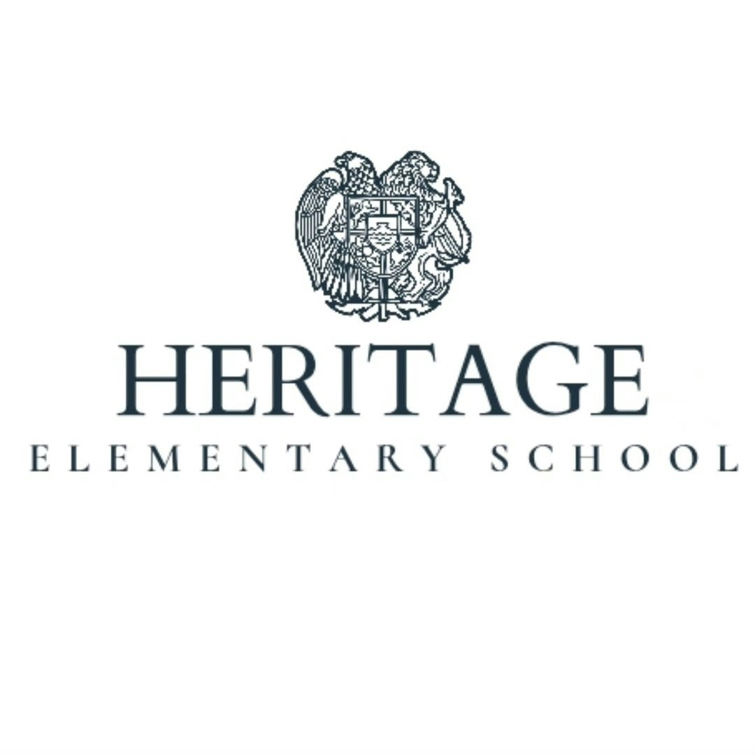 Heritage Elementary School logo with an eagle emblem above the text.
