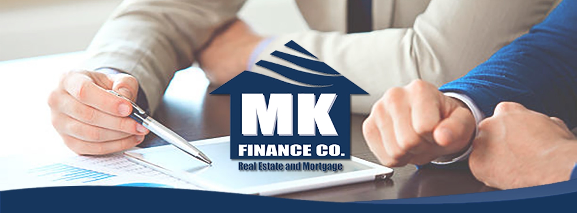 Two people signing a document with the MK Finance Co. logo overlayed.