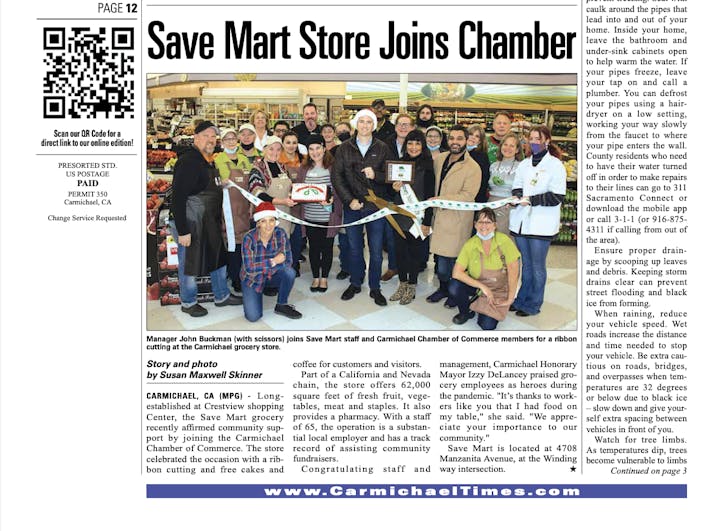 A group photo of Save Mart staff and Carmichael Chamber members at a ribbon-cutting event for joining the Chamber.