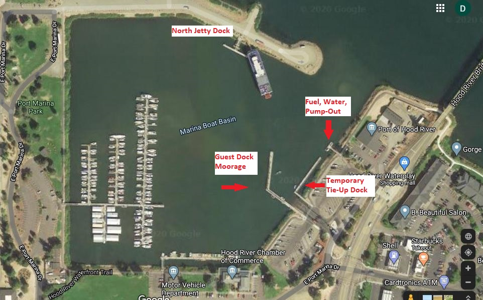 Aerial view of a marina with labeled docks, services and nearby amenities.