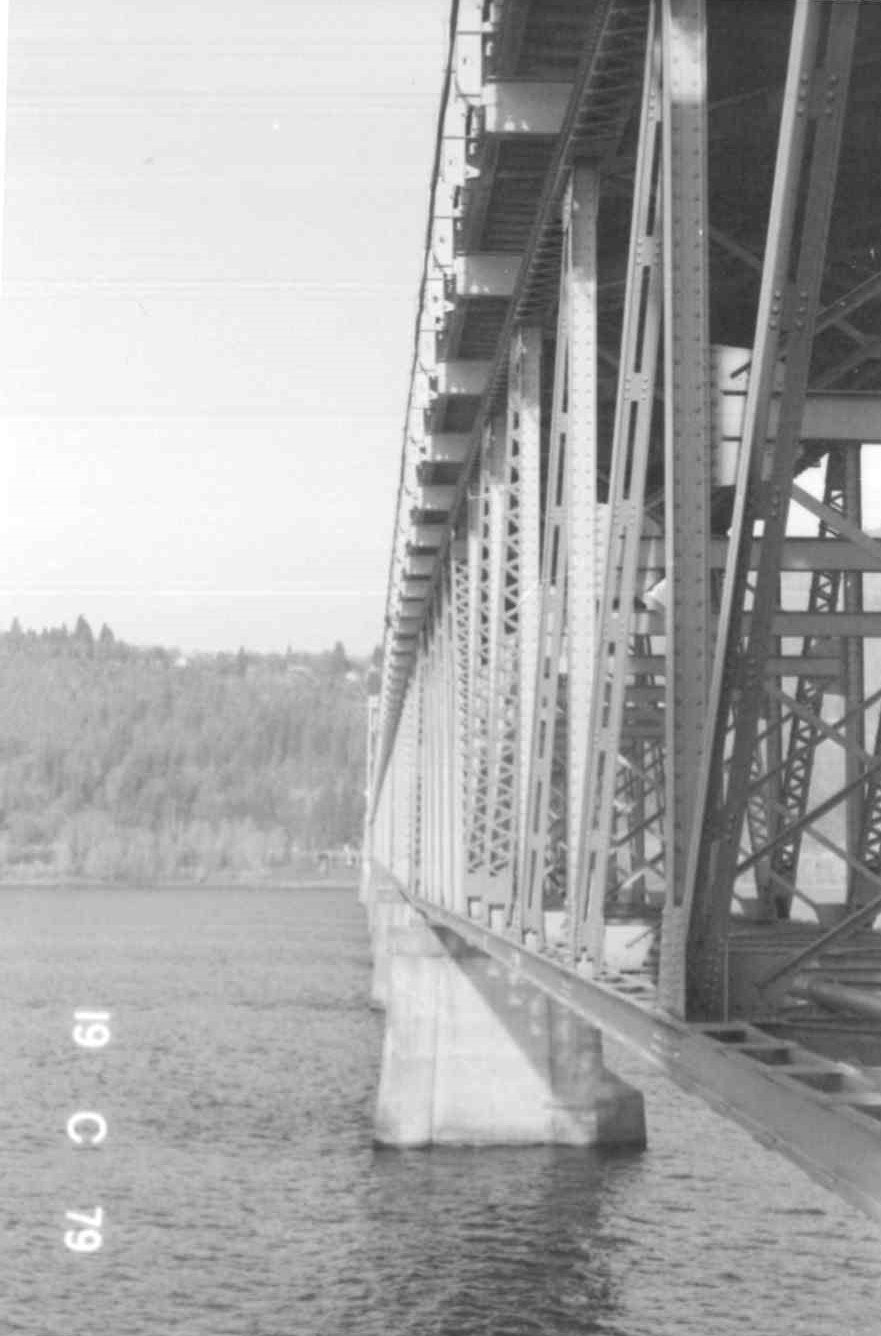 Black and white photo of a bridge's side view over water, with date "19 C 79" printed on it.