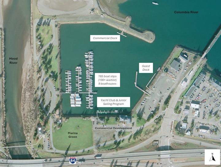 Aerial map showing docks, boat slips, a yacht club, and commercial areas near Hood River and the Columbia River.