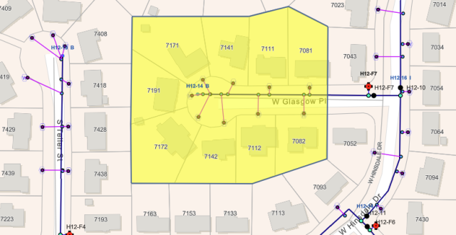 The image shows a map section with a highlighted area and various numbered locations and connections, likely representing utility data.