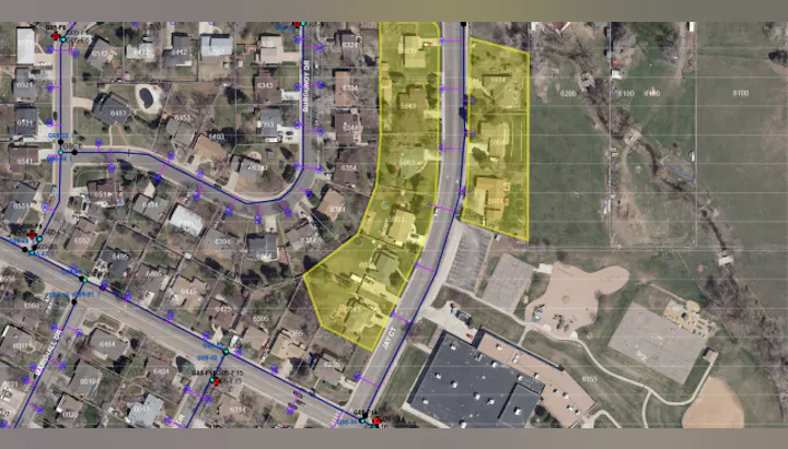 The image shows a map with residential areas highlighted in yellow, along with roadways and nearby facilities.