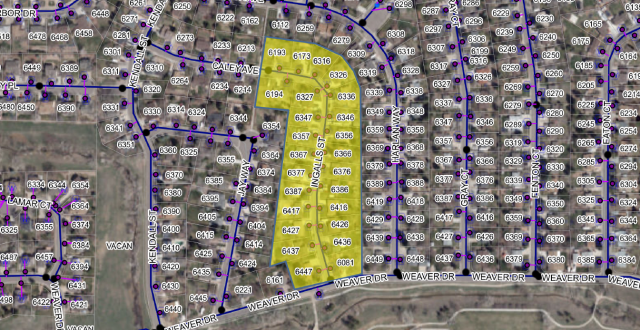 The image shows a map with highlighted sections and numbered lots, likely representing residential properties and streets.