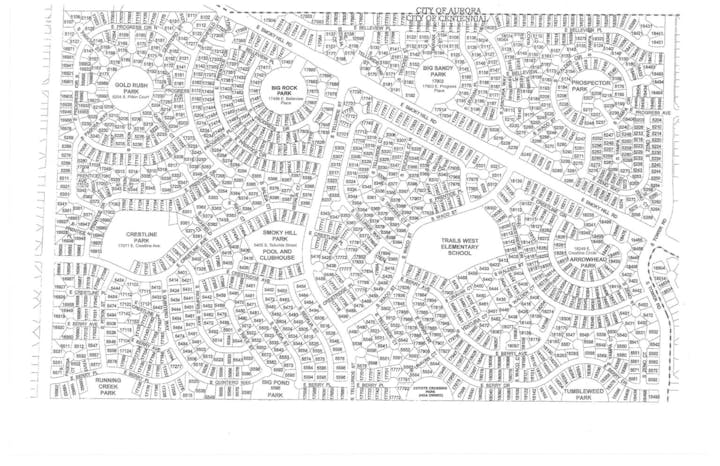 Black and white residential city map showing streets, parks, and schools.