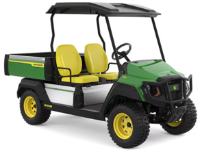 A compact, two-seater utility vehicle with a bed for cargo, featuring yellow seats and a green and black design.