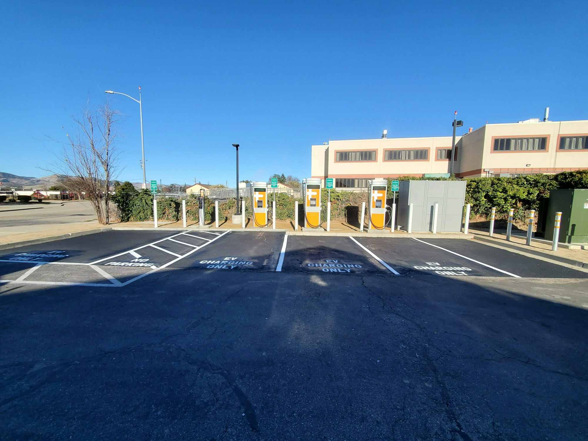 May contain: road, intersection, tarmac, asphalt, car, transportation, vehicle, and automobile