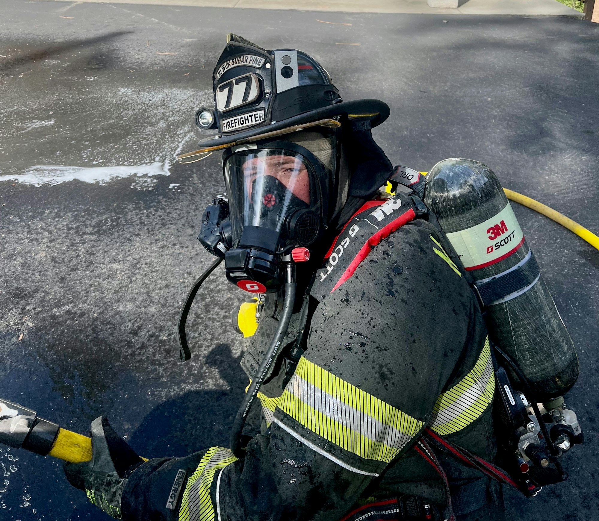A firefighter in protective our new helmets, thanks to a grant from the California Fire Foundation