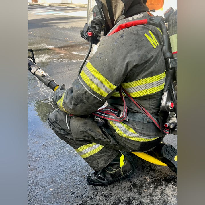 A firefighter wearing our new boots, with thanks from a grant from the California Fire Foundation