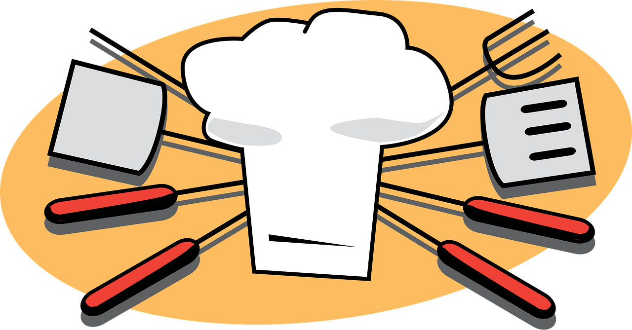Chef's hat with spatulas and forks on an orange background.
