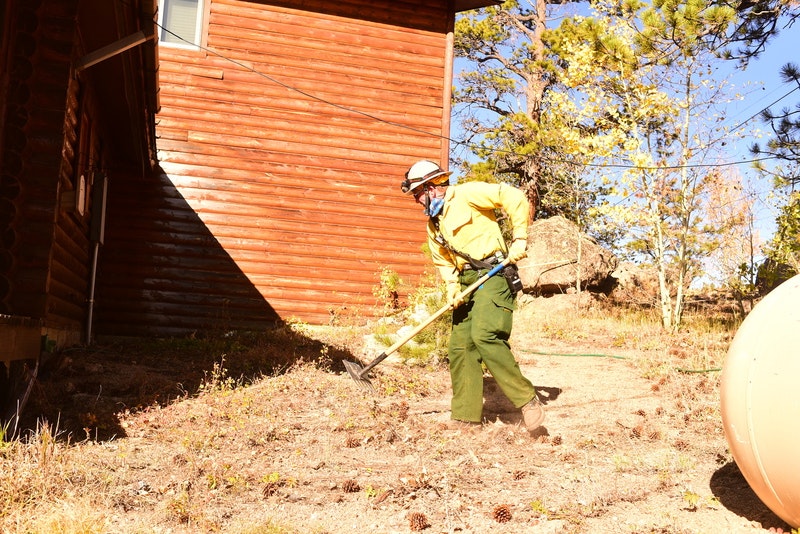 May contain: soil, garden, nature, outdoors, clothing, hardhat, helmet, adult, male, man, person, worker, gardening, device, shovel, and tool
