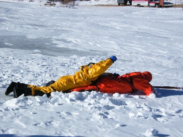 May contain: clothing, coat, jacket, glove, outdoors, nature, person, piste, snow, and sport