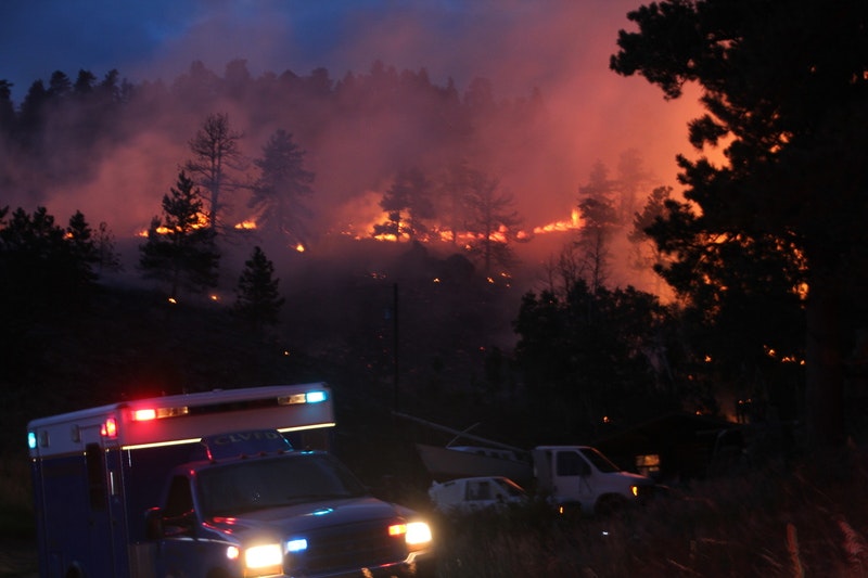 May contain: car, transportation, vehicle, fire, and forest fire