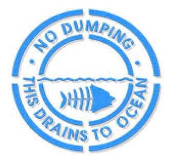 A blue and white "No Dumping - Drains to Ocean" sign with a fish symbol.