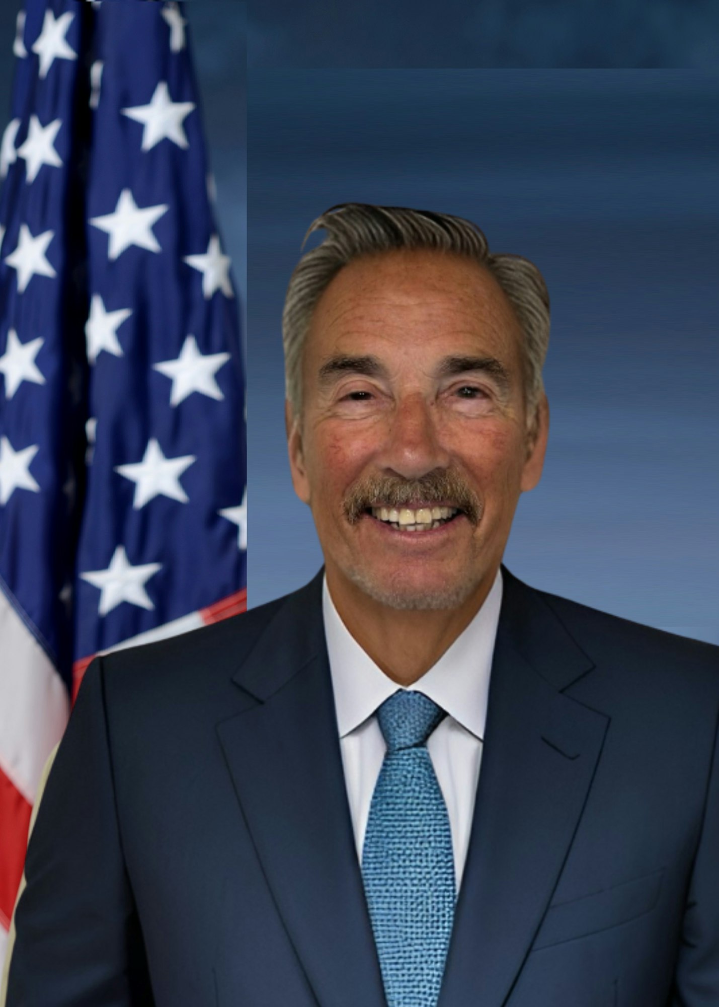The image features a smiling man in a suit, with a blue tie, set against a backdrop of the American flag.