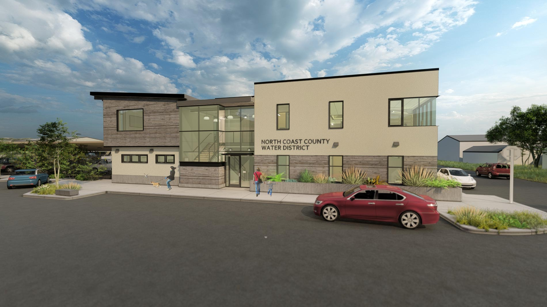 Modern building labeled "North Coast County Water District" with cars and people outside.