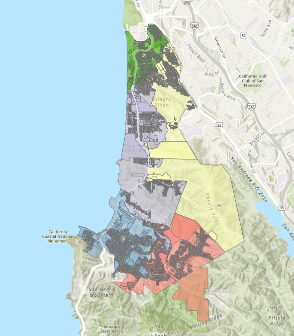 The image shows a map of a coastal area with various colored zones, likely indicating different neighborhoods or regions.
