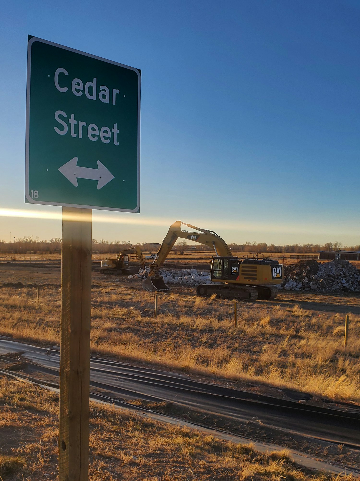 May contain: sign, symbol, and road