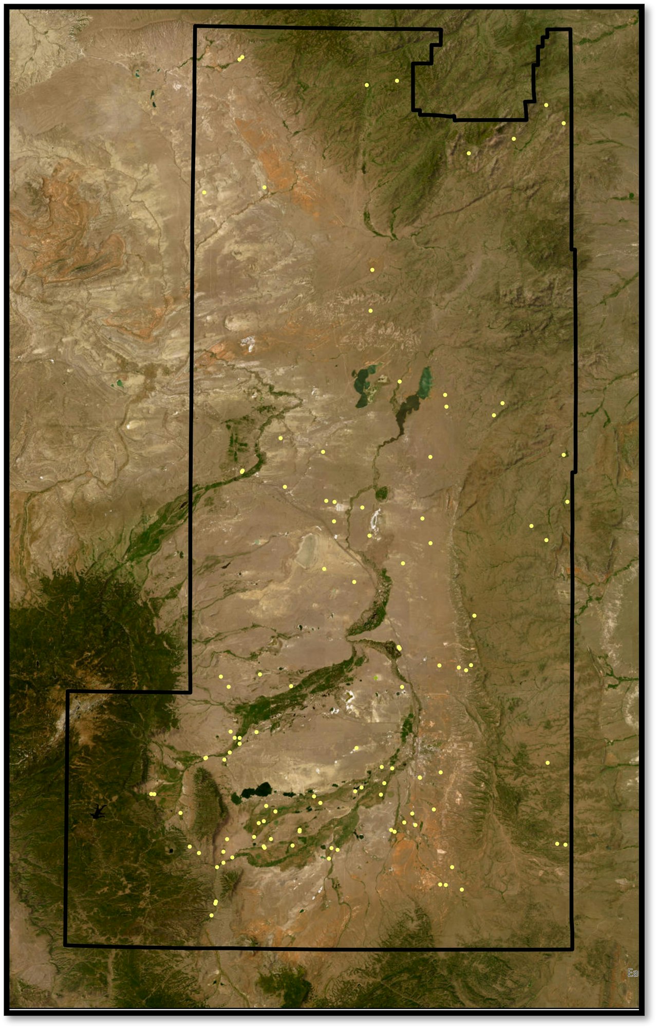 Satellite view of a landscape with vegetation, possible settlements (yellow dots), outlined regions possibly for data analysis.