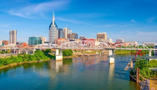 May contain: city, urban, architecture, building, cityscape, nature, outdoors, scenery, metropolis, water, waterfront, landscape, and bridge