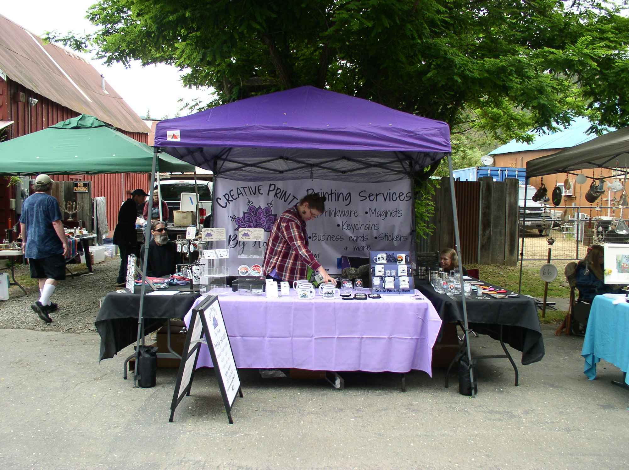 May contain: person, human, kiosk, and tent
