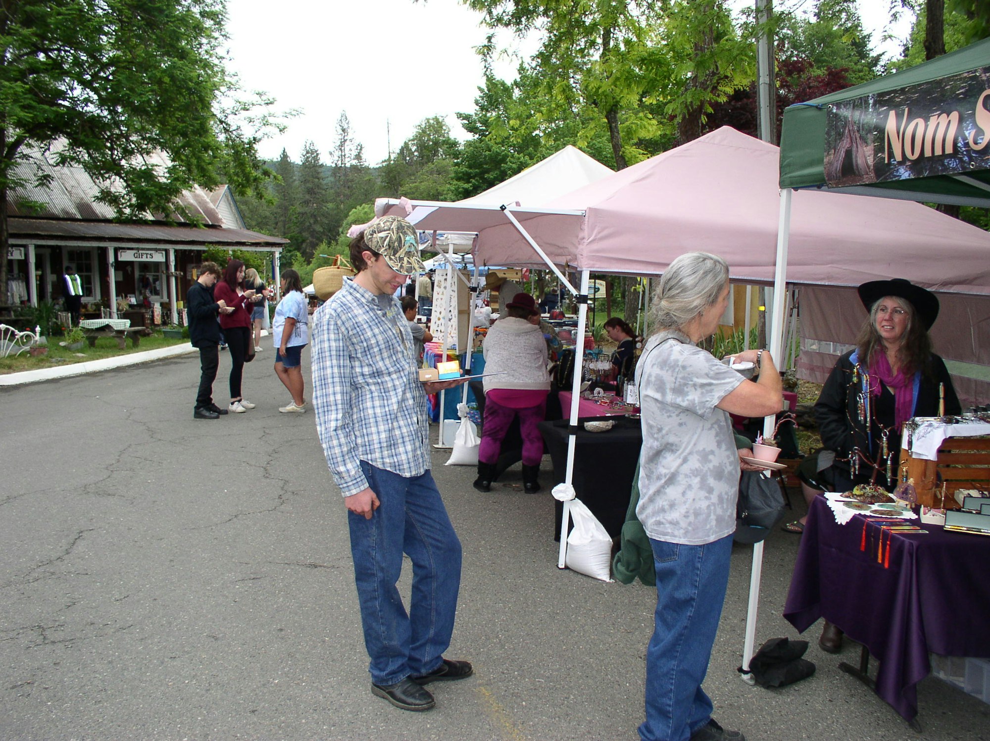 May contain: person, human, shoe, footwear, clothing, apparel, pants, and tent