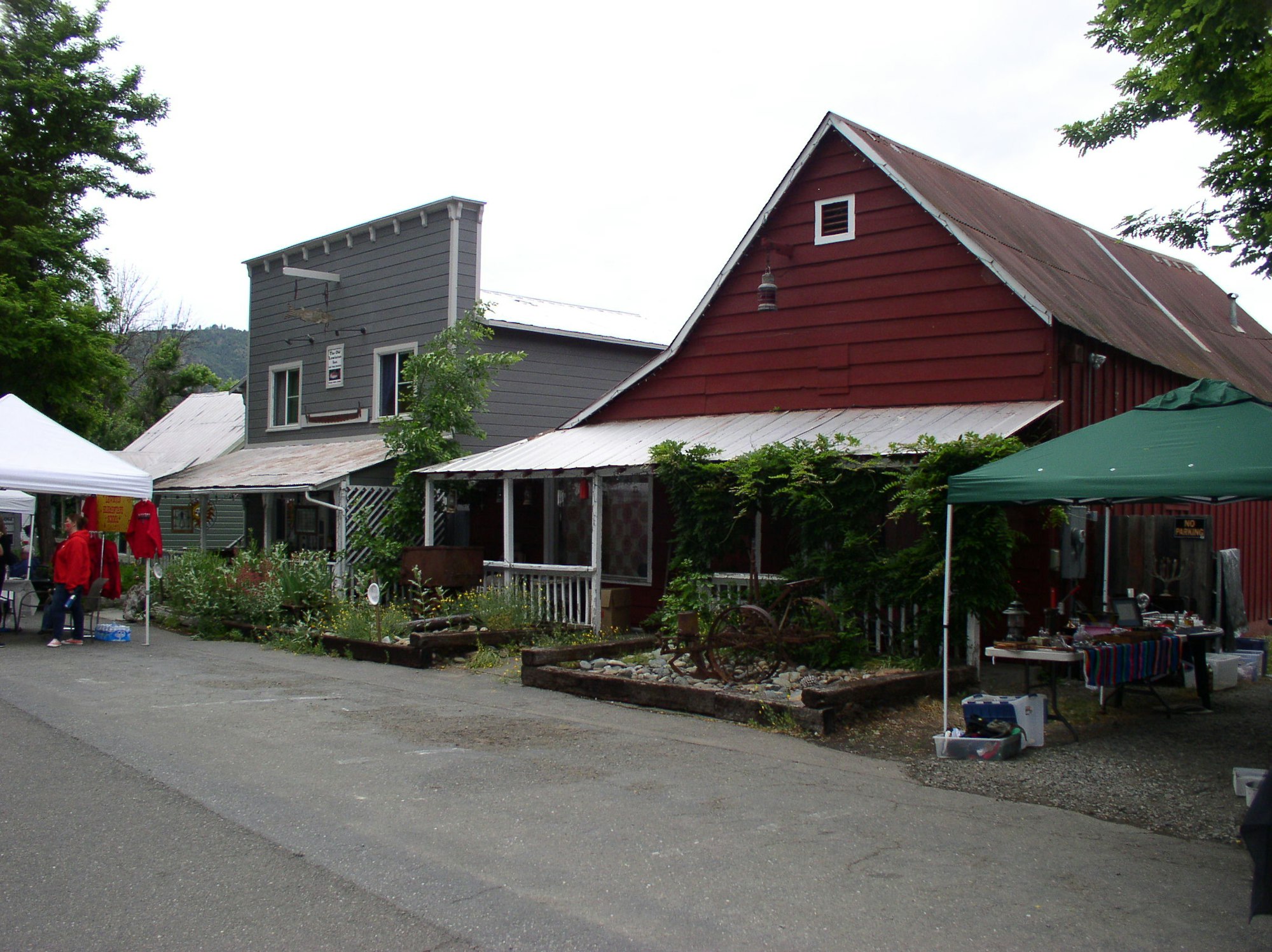 May contain: person, human, neighborhood, building, urban, roof, and suburb