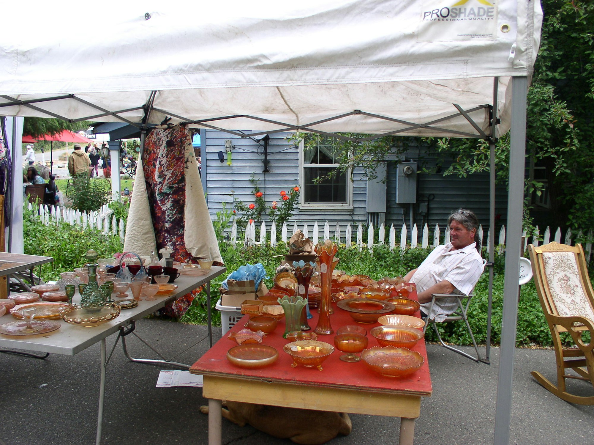 May contain: person, human, furniture, table, dining table, and plant