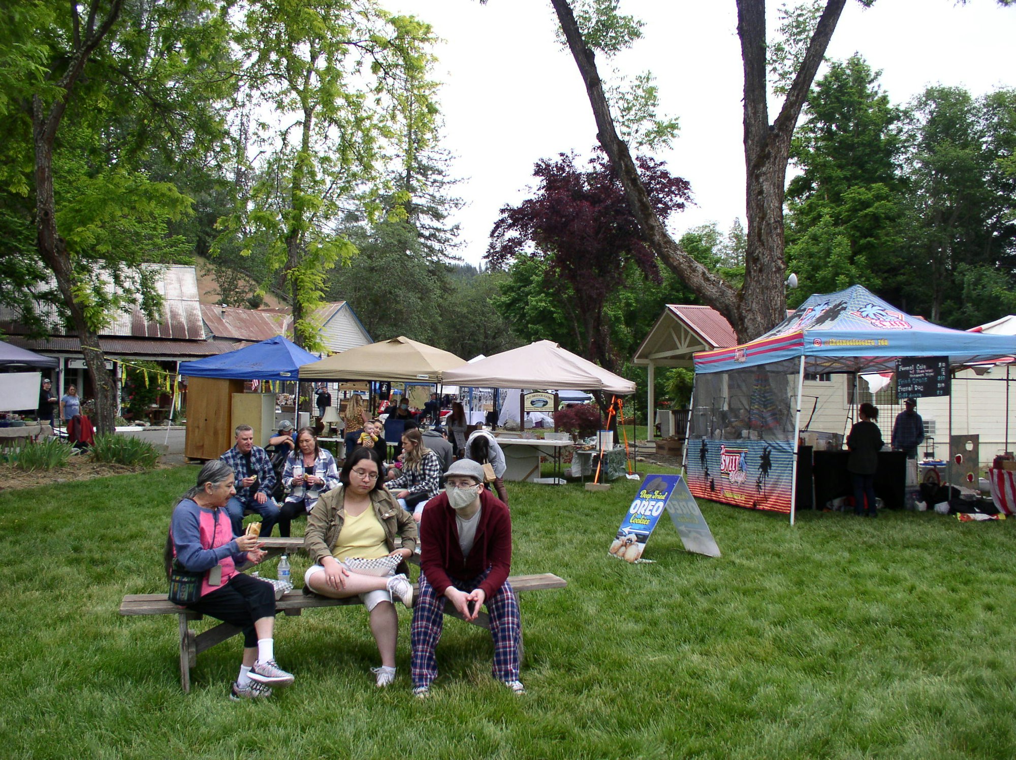 May contain: person, human, meal, food, tent, clothing, and apparel