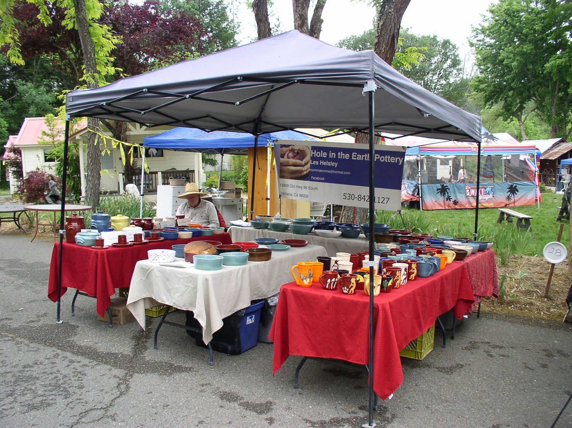 May contain: person, human, tent, tablecloth, and flagstone