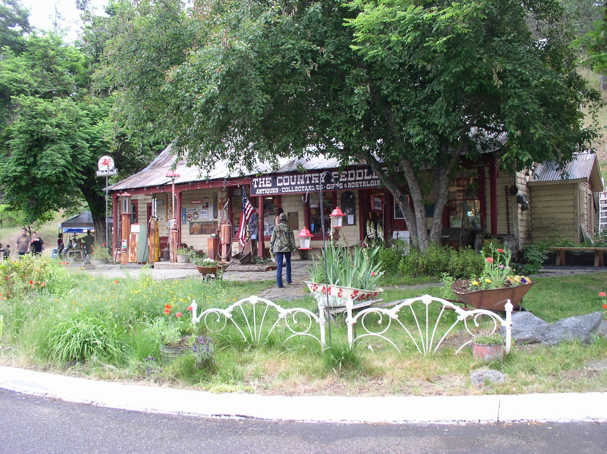 May contain: person, human, arbour, outdoors, garden, patio, and porch