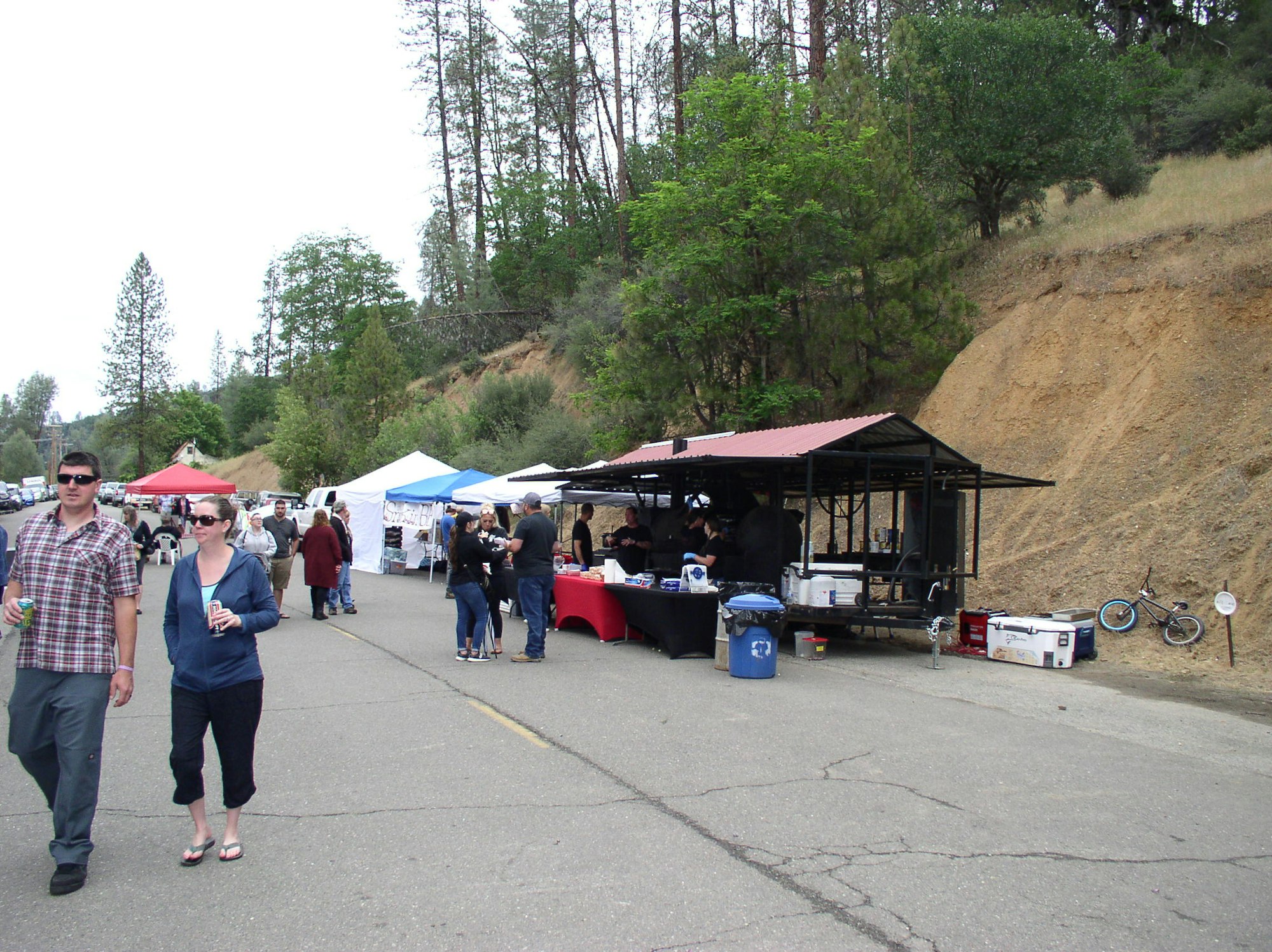 May contain: person, human, shoe, clothing, footwear, apparel, kiosk, sunglasses, accessories, and accessory