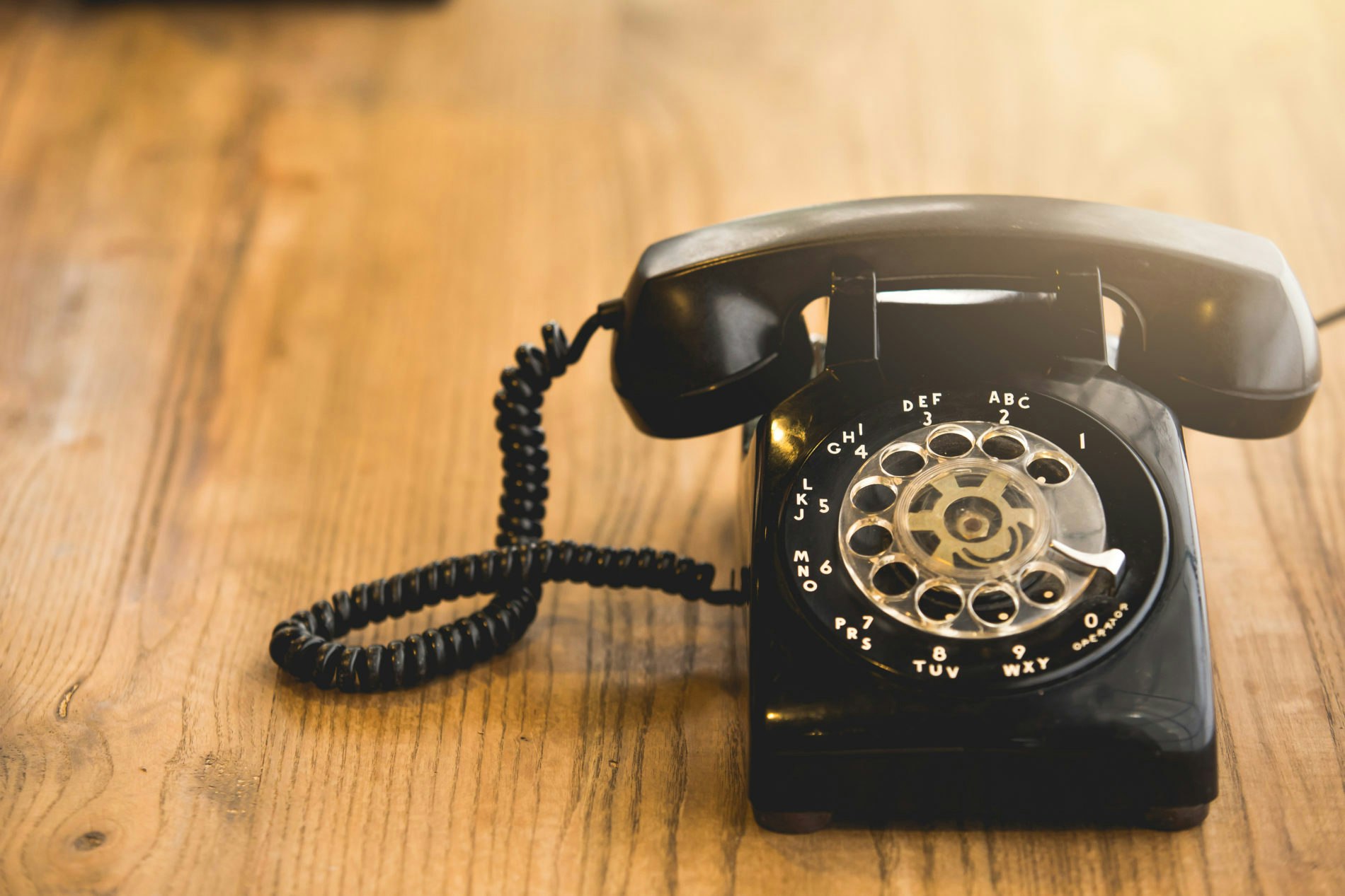 May contain: phone, electronics, and dial telephone