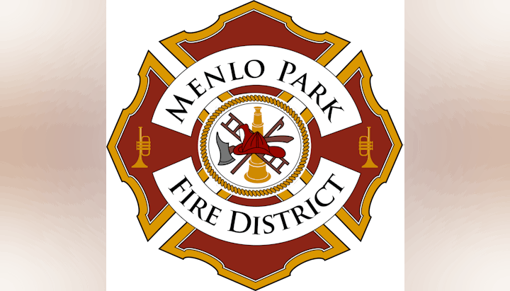 Emblem of the Menlo Park Fire District, featuring firefighting tools and symbols.