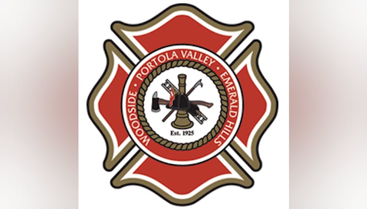 A fire department emblem with a fire hydrant, axe, and names Portola Valley, Woodside, Emerald Hills. Est. 1925.