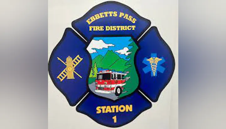 A badge for Ebbetts Pass Fire District Station 1 with symbols for firefighting and medical services.