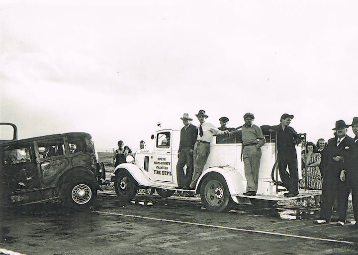 May contain: person, man, adult, male, car, vehicle, transportation, wheel, and machine