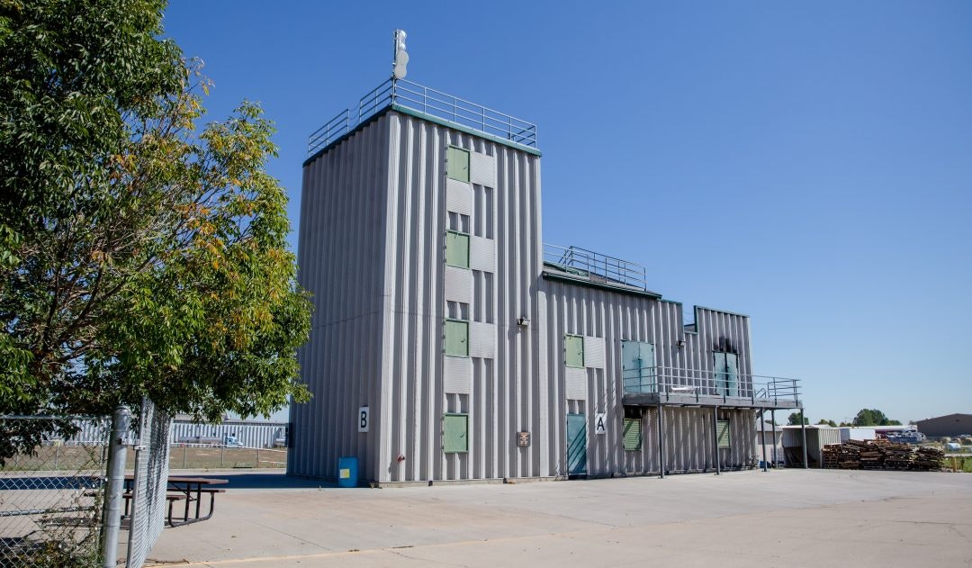 May contain: building and hangar