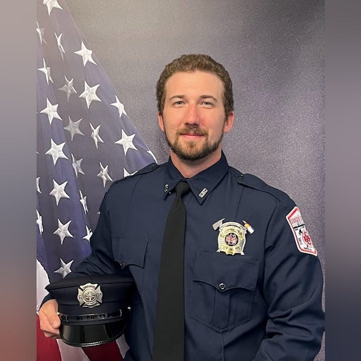 May contain: officer, person, police officer, accessories, formal wear, tie, police, adult, male, man, and captain