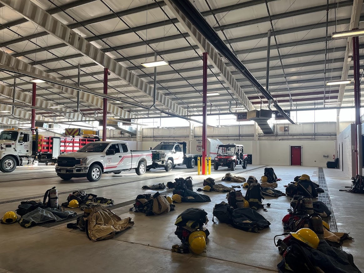 May contain: workshop, building, truck, transportation, and vehicle